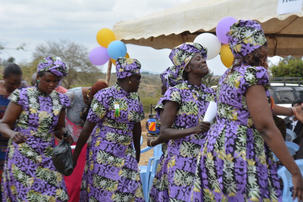 One group of ladies had their beautiful purple dresses on with matching head covers.