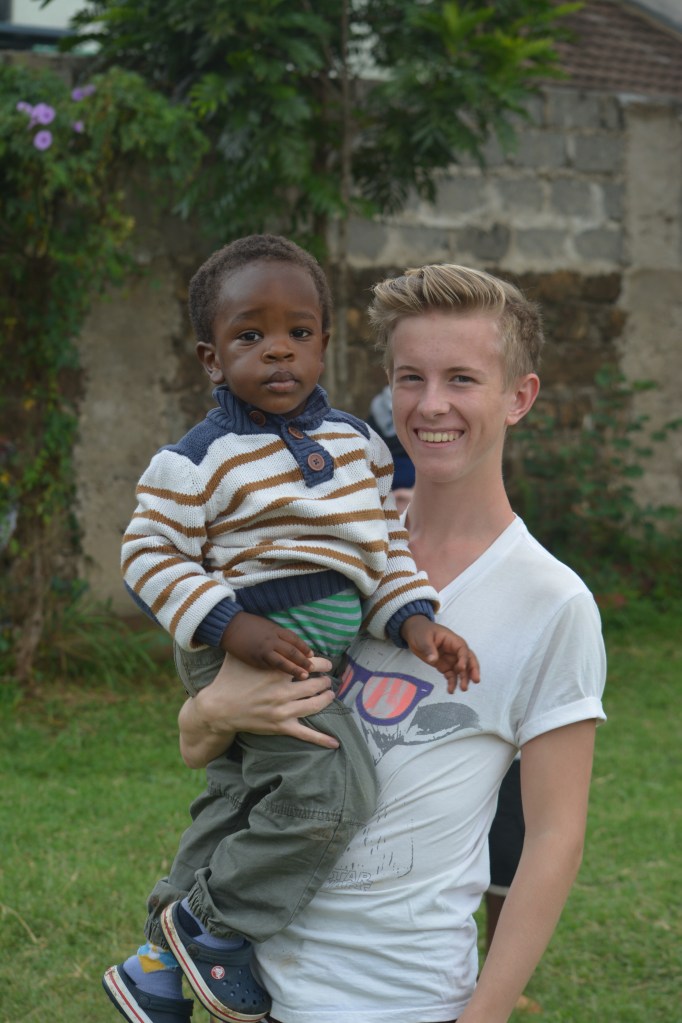 Jon Michael and 2 year old Wycliffe enjoying the day