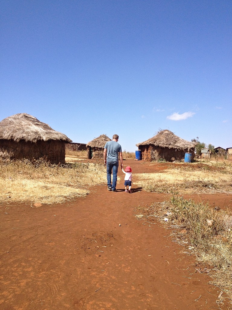 Simon and Janaie walking in the village....you can see it is still dry there even now.