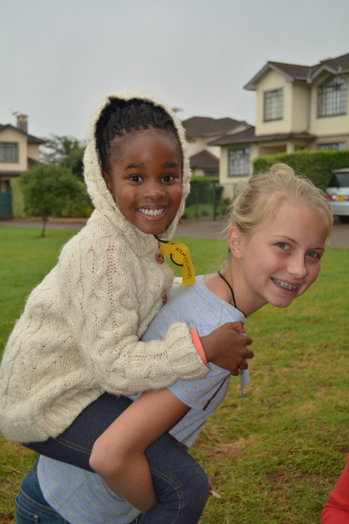 Lydia and Basiima also ready for the day.