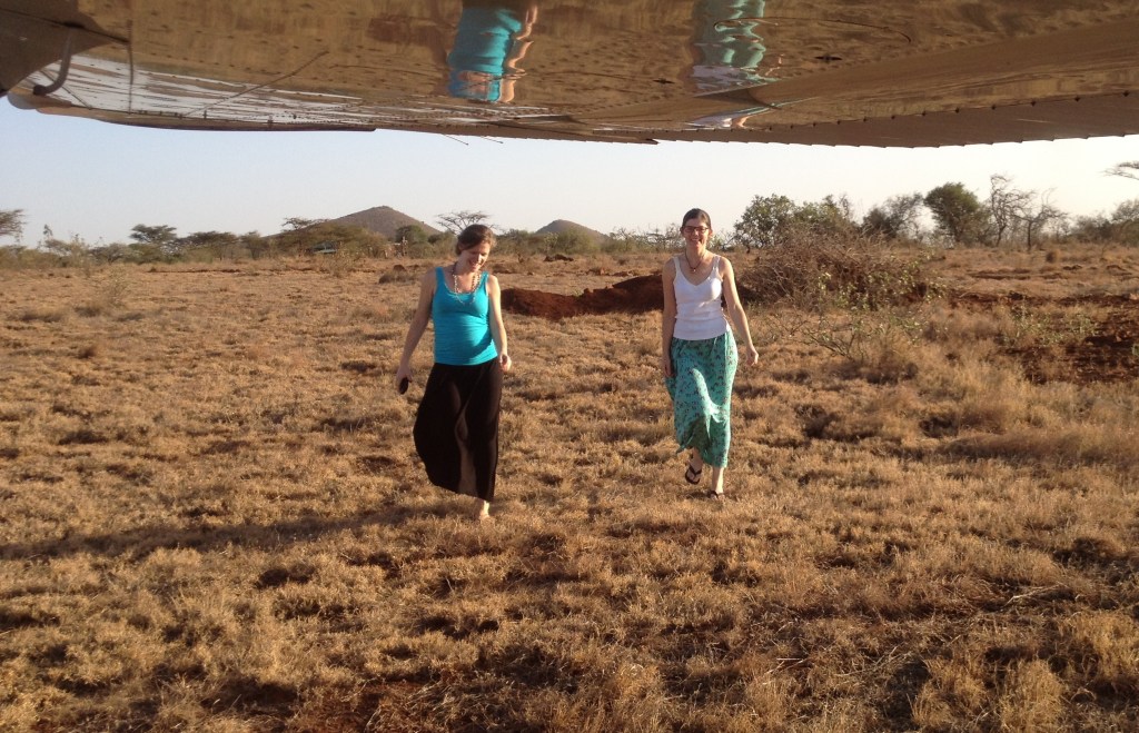Friends Chantal and Angie walking to greet our plane