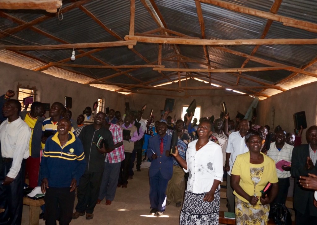 Pastors receiving their new Bibles in their own language
